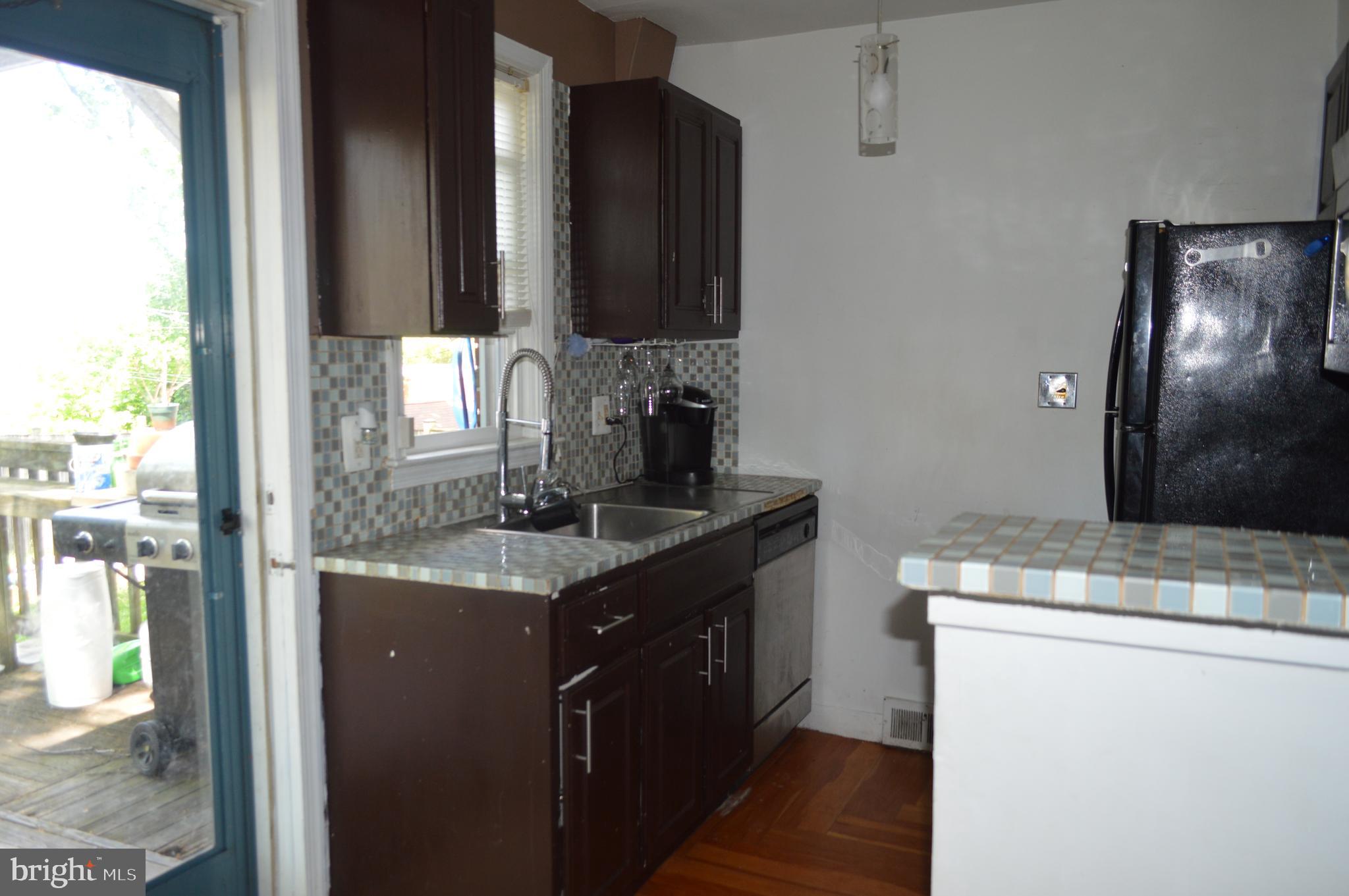 3520 Rhom Road Baltimore, MD 21207 - Photo 5 of 17 Sliding Door off kitchen to deck