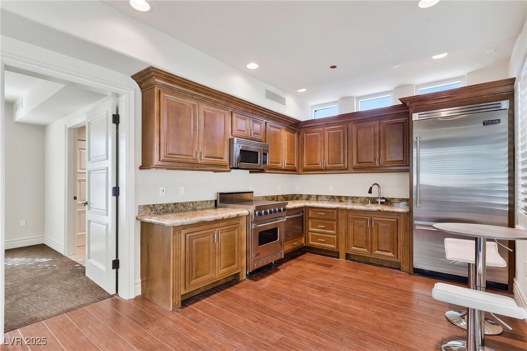 9103 Alta Drive, Unit 102 Las Vegas, NV 89145 - Photo 23 of 44 Full Kitchen and Laundry in the guest house