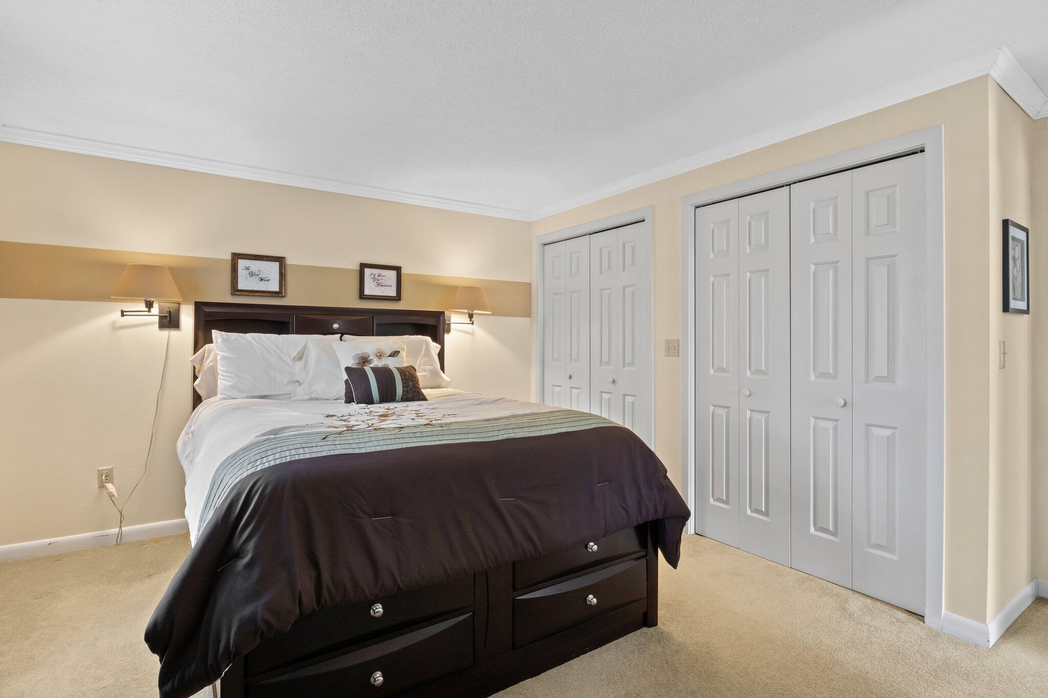 91 Shellback Way, Unit N Mashpee, MA 02649 - Photo 15 of 40 a bedroom with a bed and a window