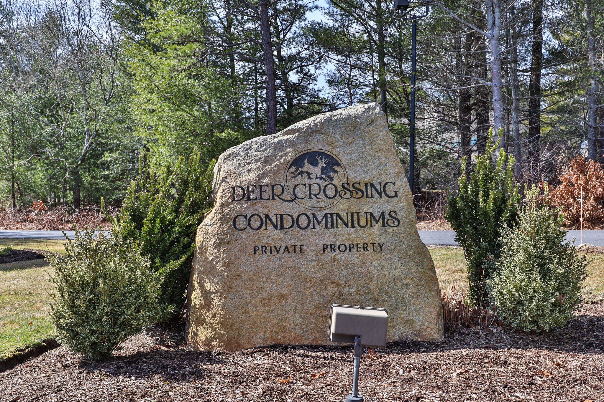 91 Shellback Way, Unit N Mashpee, MA 02649 - Photo 36 of 40 a sign on the side of the road