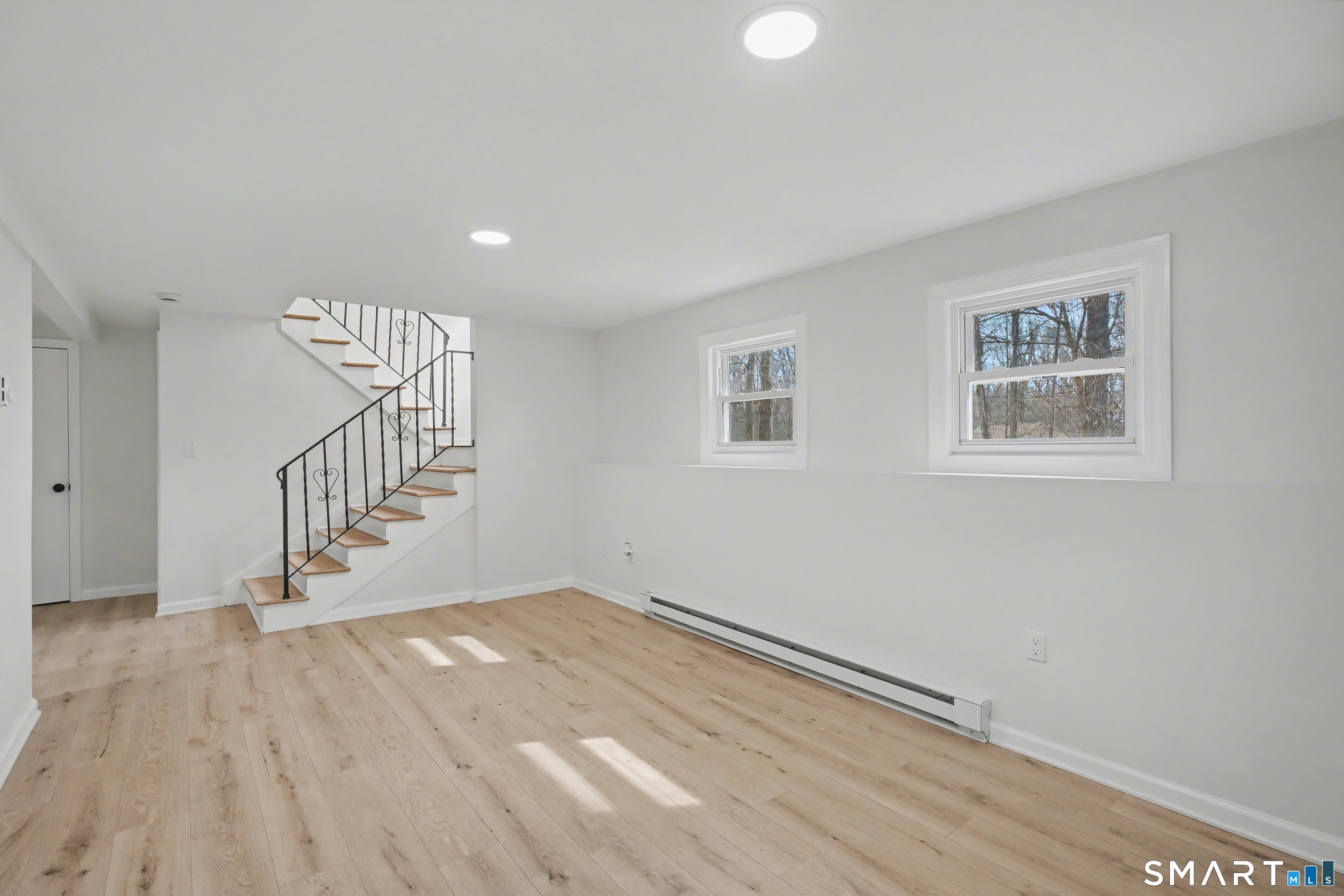 12 Rustic Lane Madison, CT 06443 - Photo 17 of 29 First floor living room