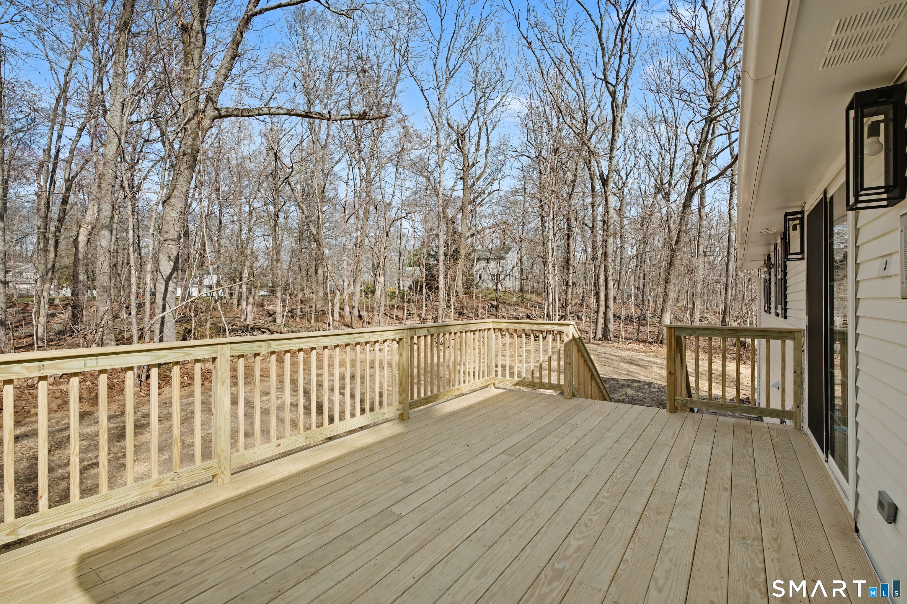 12 Rustic Lane Madison, CT 06443 - Photo 10 of 29 Brand new deck welcomes you off the kitchen