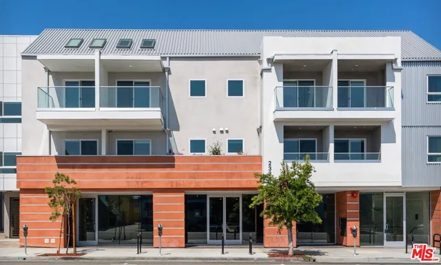 a front view of multi story residential apartment building