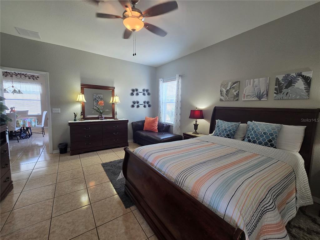 219 Cloverdale Road Winter Haven, FL 33884 - Photo 19 of 29 a bedroom with bed and window