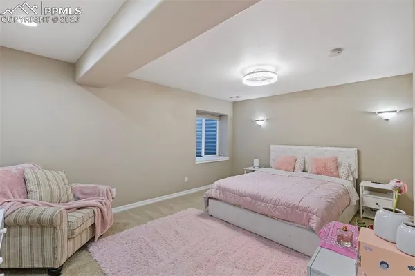 a living room with a couch and a window