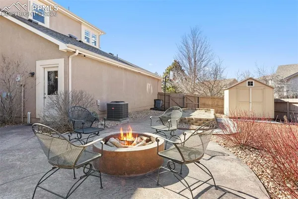 a house view with a backyard space