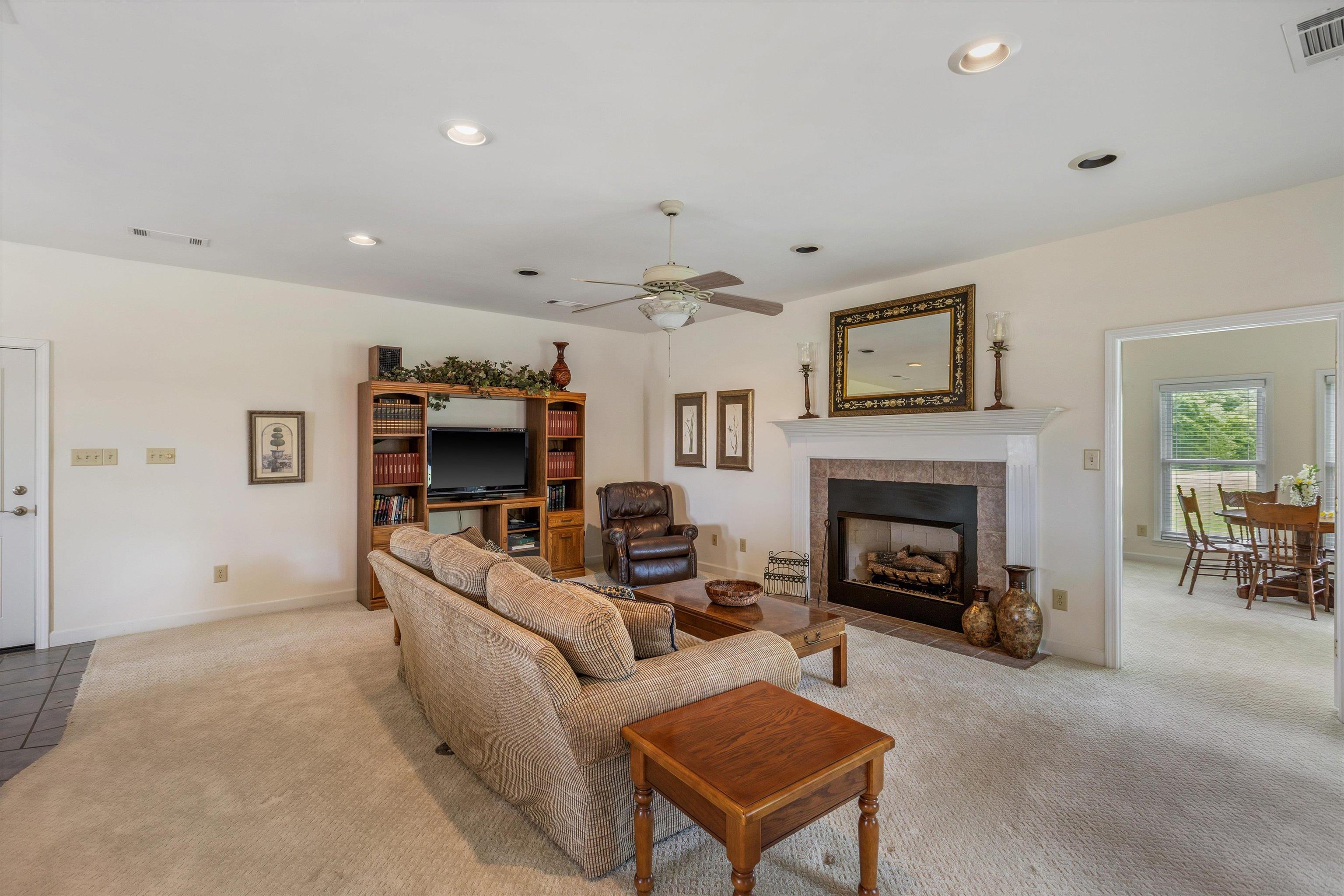 2225 Candy Lane Burlison, TN 38015 - Photo 6 of 27 Living area with a built-in media center, recessed lighting, and a ceiling fan