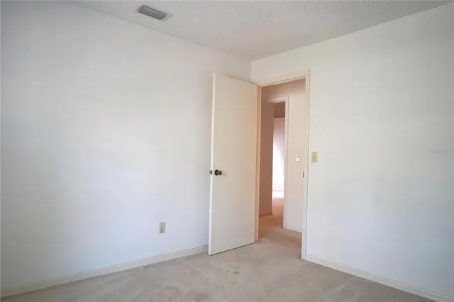 a kitchen with cabinets appliances and a sink