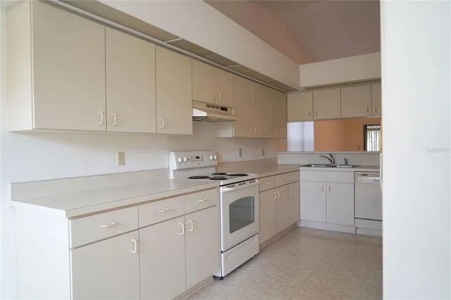 a view of a room with a large window