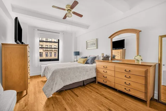a view of a livingroom with furniture and wooden floor