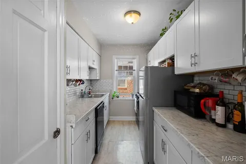 $385,000 | 7030 Amherst Avenue, University City, MO 63130