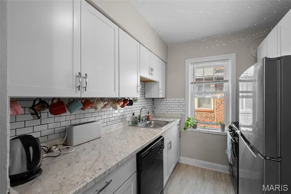 $385,000 | 7030 Amherst Avenue, University City, MO 63130