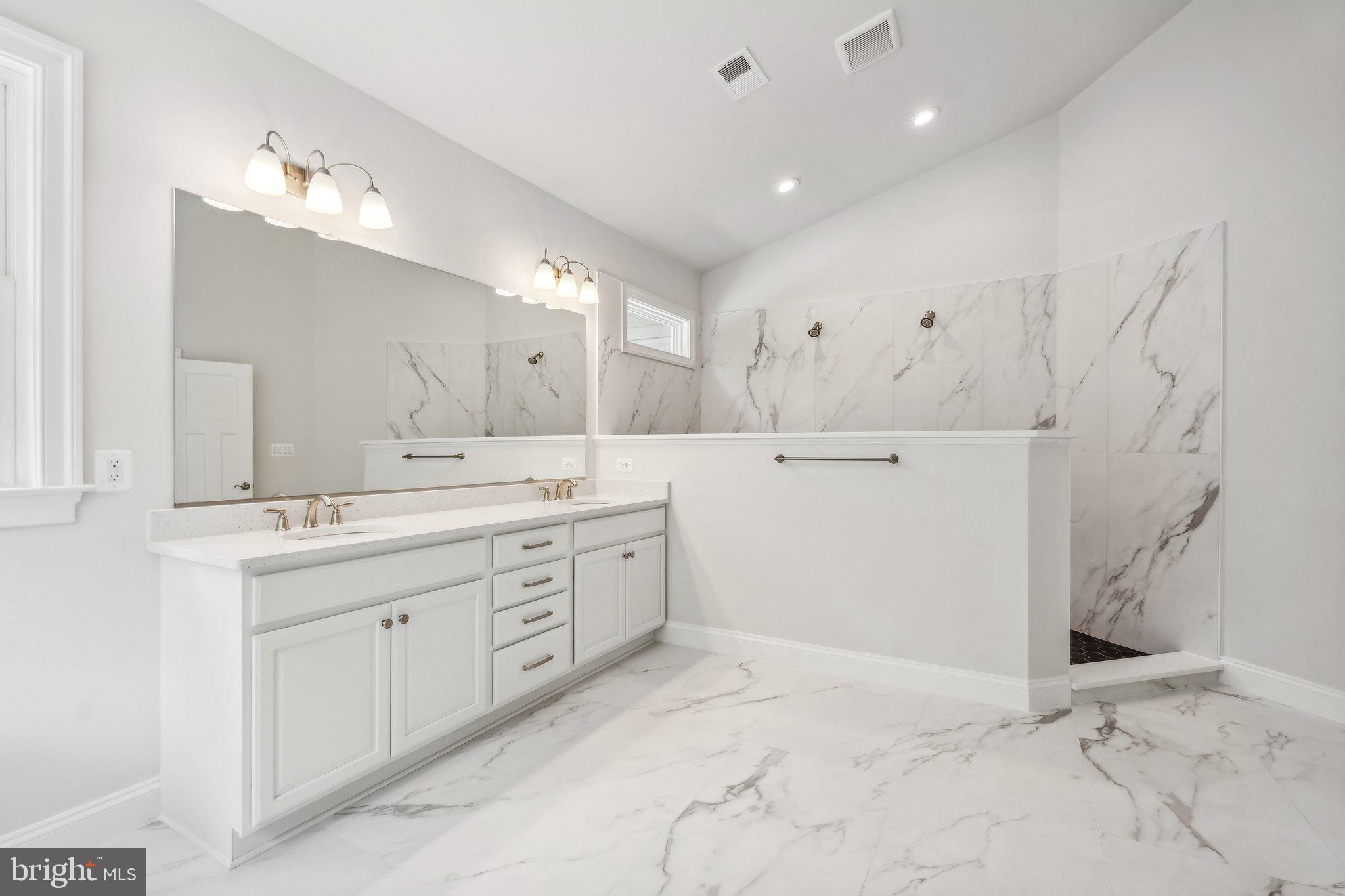 13749 Orlando Road Nokesville, VA 20181 - Photo 19 of 42 a spacious bathroom with a double vanity sink mirror and
