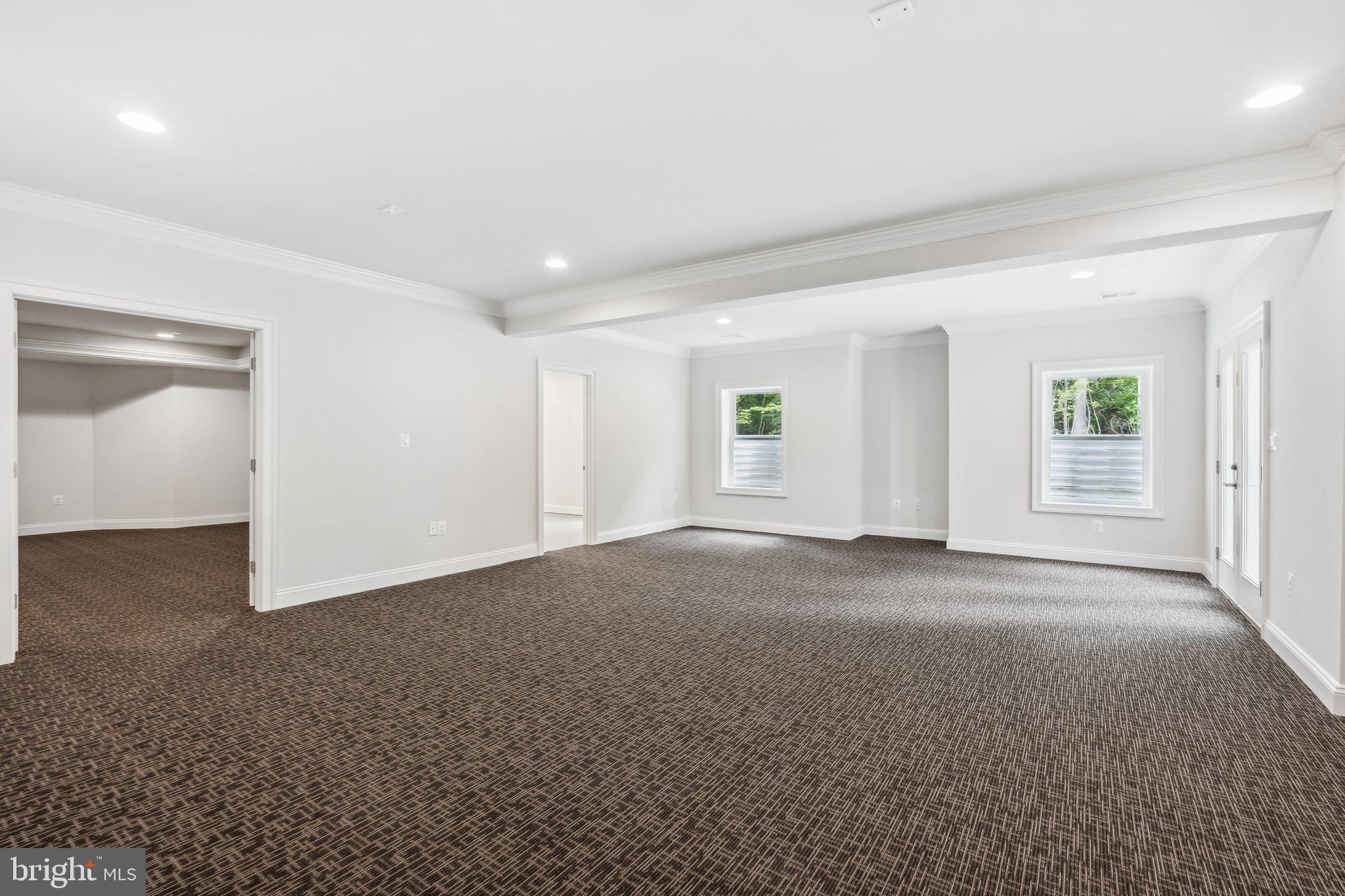 13749 Orlando Road Nokesville, VA 20181 - Photo 21 of 42 an empty room with windows and closet