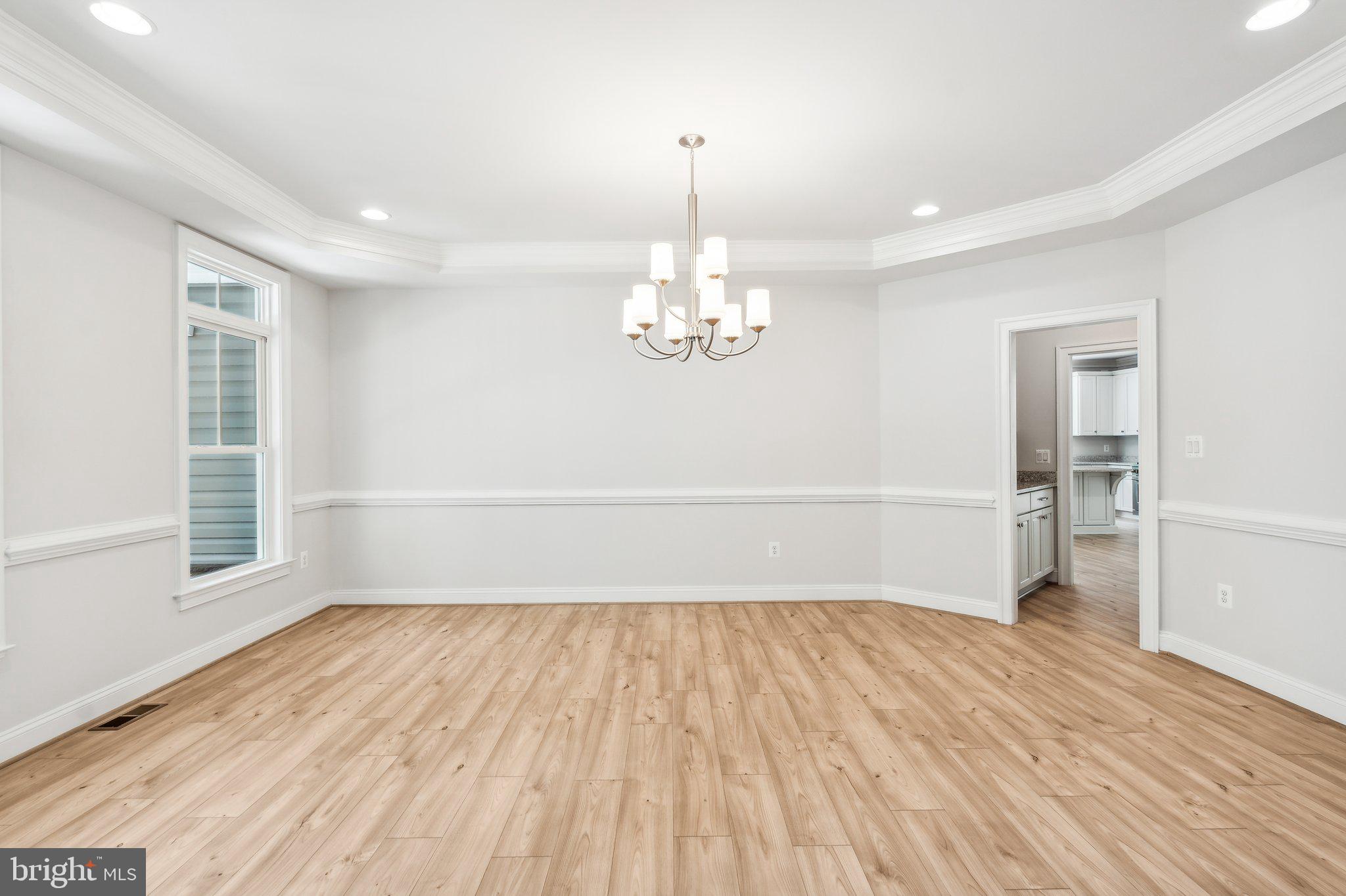 13749 Orlando Road Nokesville, VA 20181 - Photo 31 of 42 wooden floor in an empty room with a window