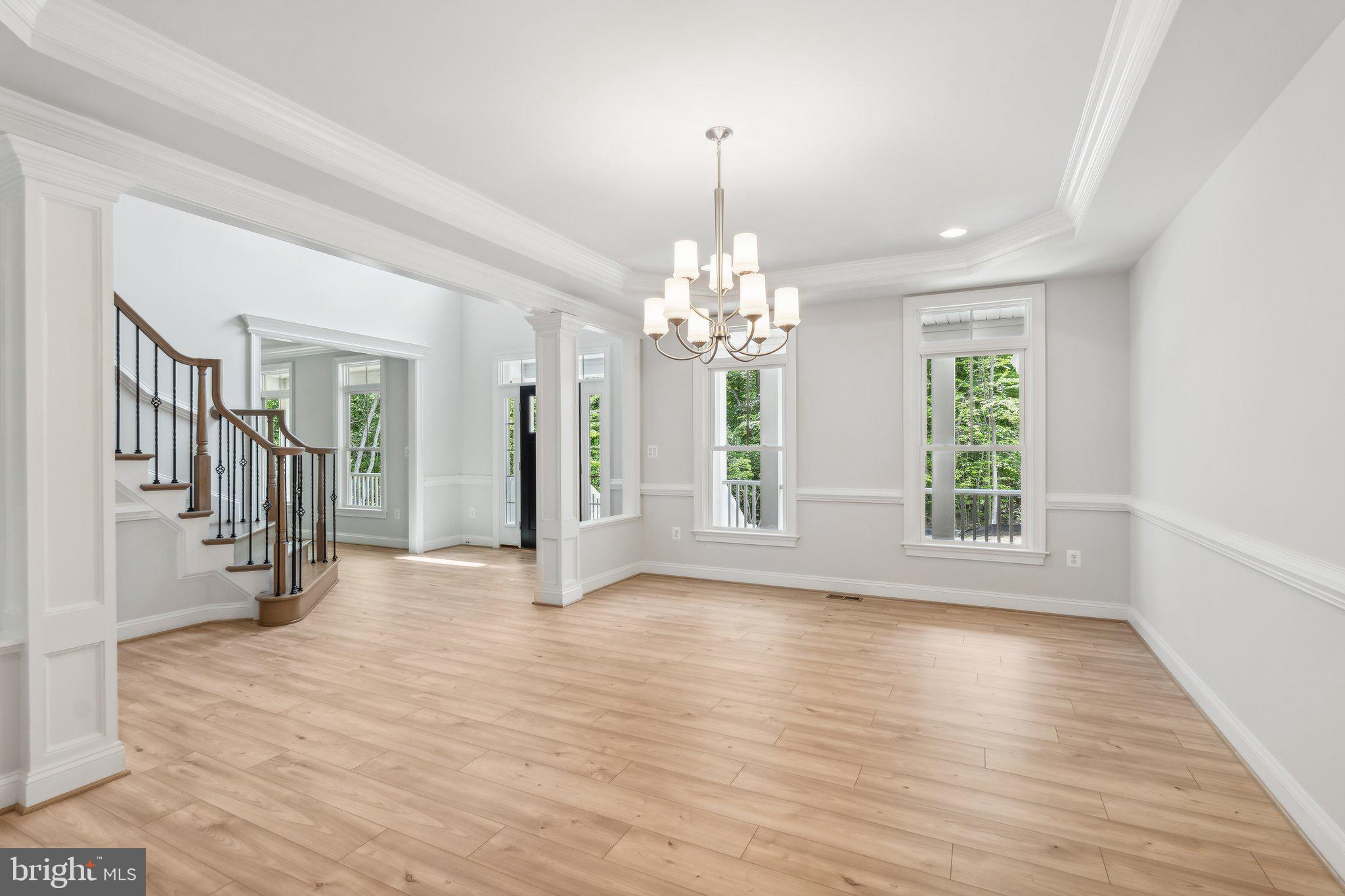 13749 Orlando Road Nokesville, VA 20181 - Photo 32 of 42 a view of an empty room with wooden floor and a window