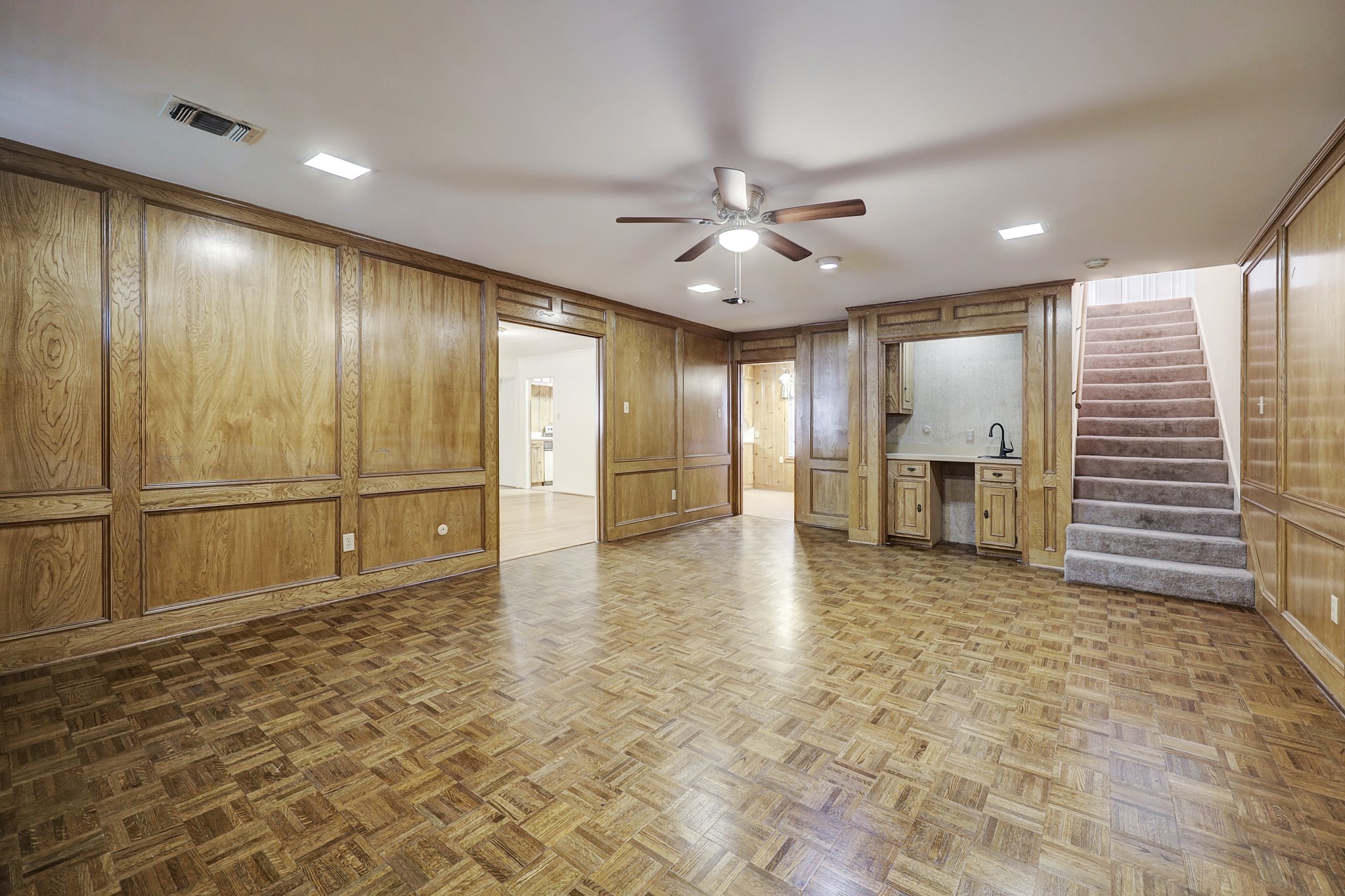 4002 Portsmouth Street Houston, TX 77027 - Photo 5 of 15 a view of a livingroom with a chandelier