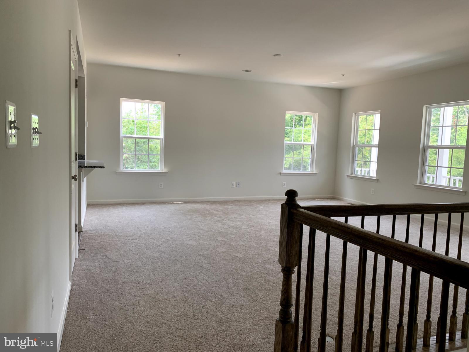 263 Trails Way Joppa, MD 21085 - Photo 7 of 27 a view of hallway with windows
