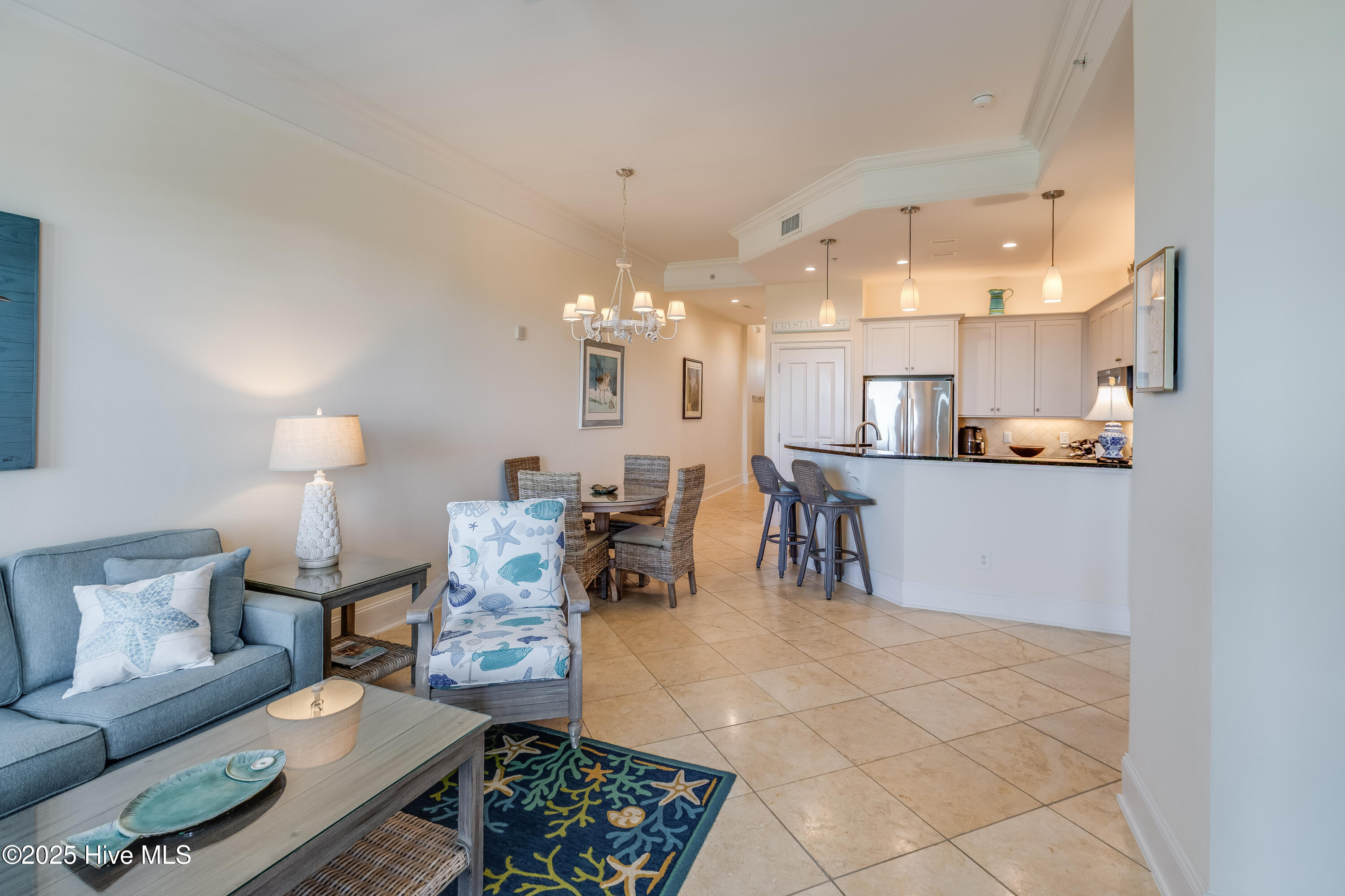 1435 Salter Path Road, Unit C1 Indian Beach, NC 28512 - Photo 6 of 47 Soaring 11 ft ceilings throughout the condo provide a feeling of spaciousness, luxury and grandeur.