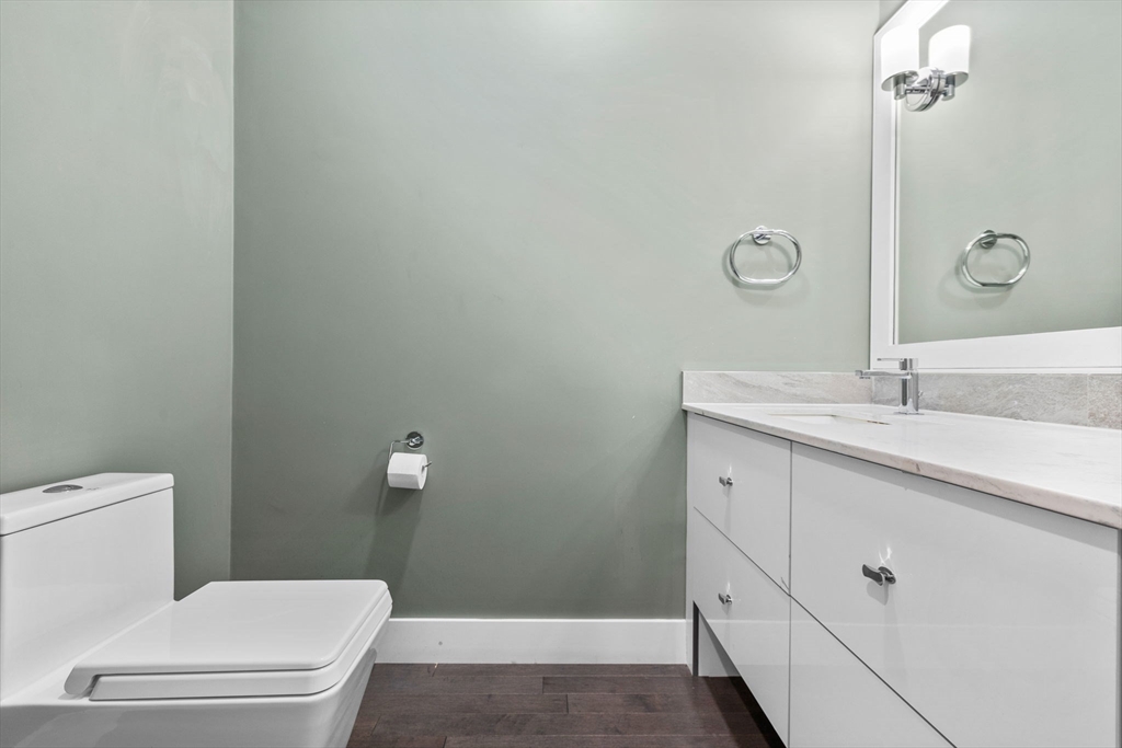 202 Rawson Road, Unit 3 Brookline, MA 02445 - Photo 13 of 17 a bathroom with a sink a toilet and shower