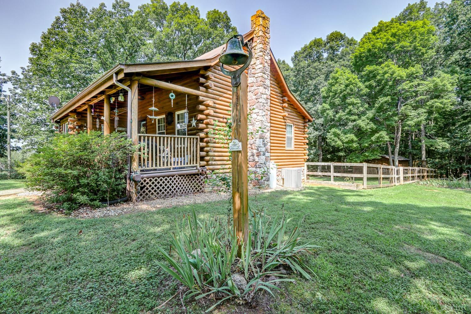 699 Gladys Road Gladys, VA 24554 - Photo 11 of 47 a view of a house with backyard and garden