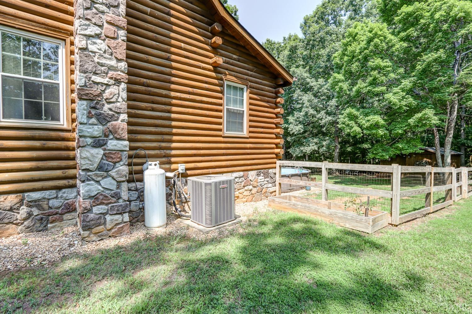 699 Gladys Road Gladys, VA 24554 - Photo 12 of 47 a view of a house with backyard and a hammock