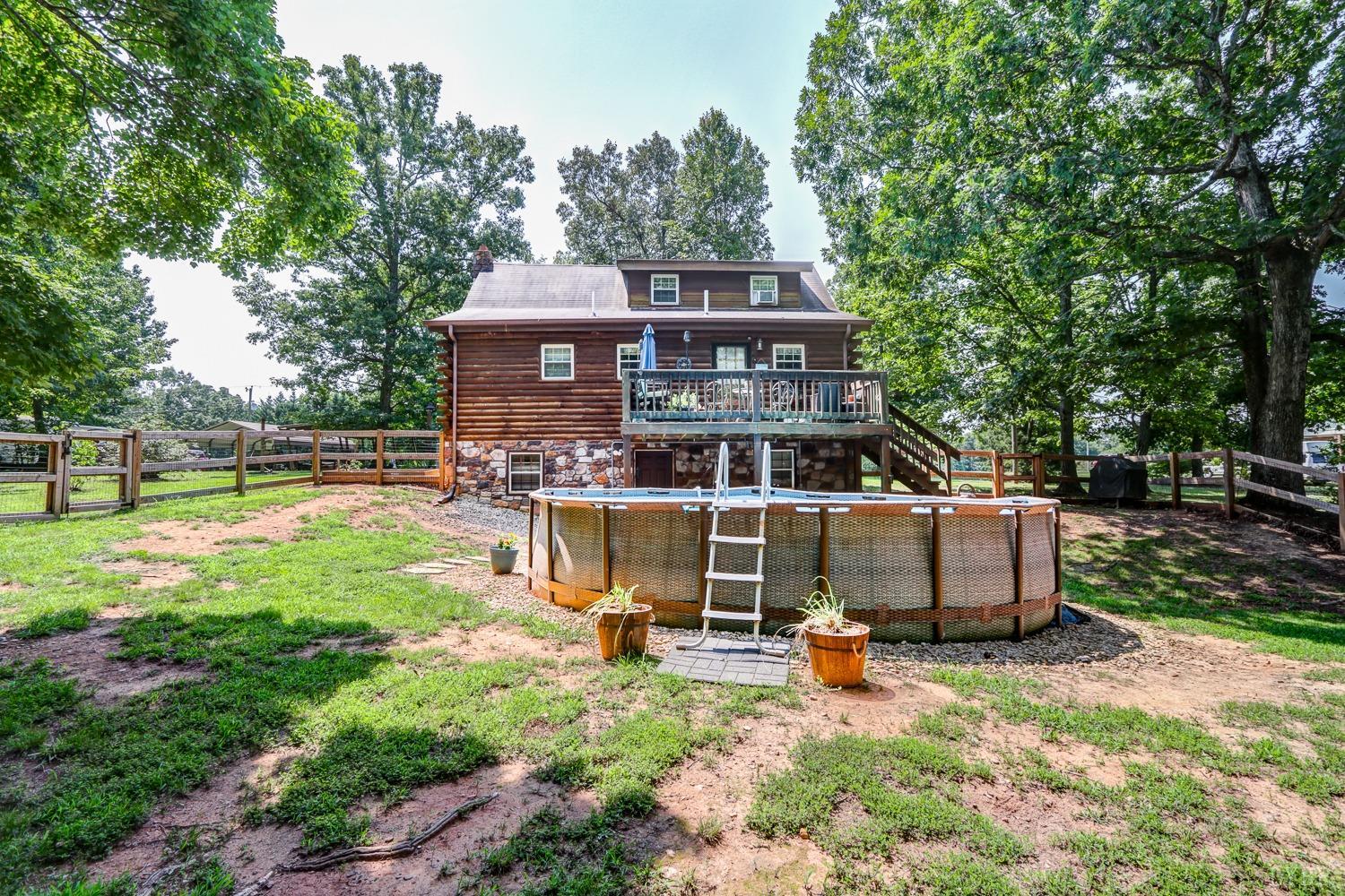 699 Gladys Road Gladys, VA 24554 - Photo 15 of 47 a view of a big yard with table and chairs