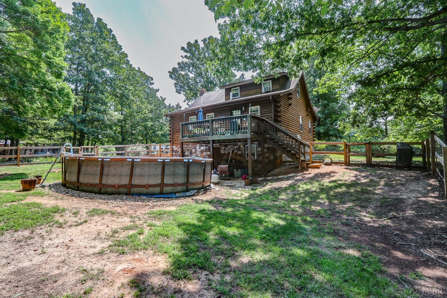 699 Gladys Road Gladys, VA 24554 - Photo 16 of 47 a view of a house with backyard and sitting area