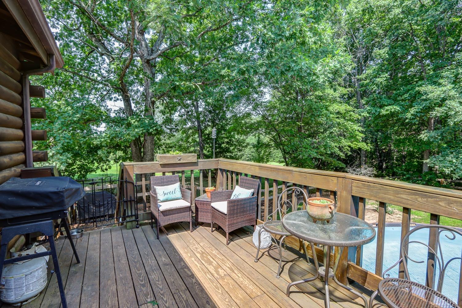 699 Gladys Road Gladys, VA 24554 - Photo 19 of 47 a view of balcony with wooden floor and outdoor seating