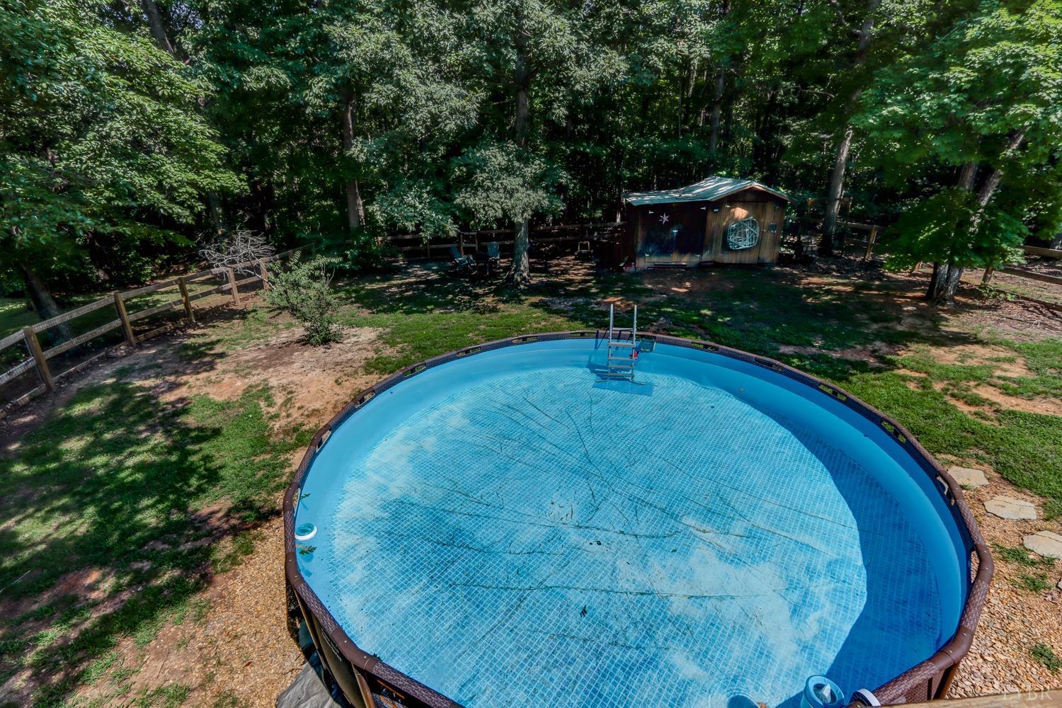 699 Gladys Road Gladys, VA 24554 - Photo 20 of 47 a view of a swimming pool with a patio