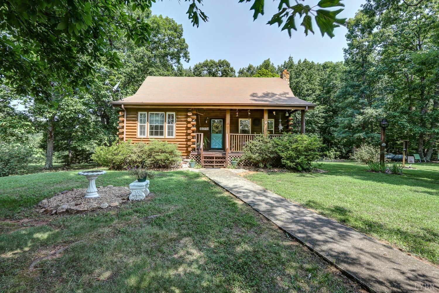 699 Gladys Road Gladys, VA 24554 - Photo 3 of 47 a front view of a house with garden