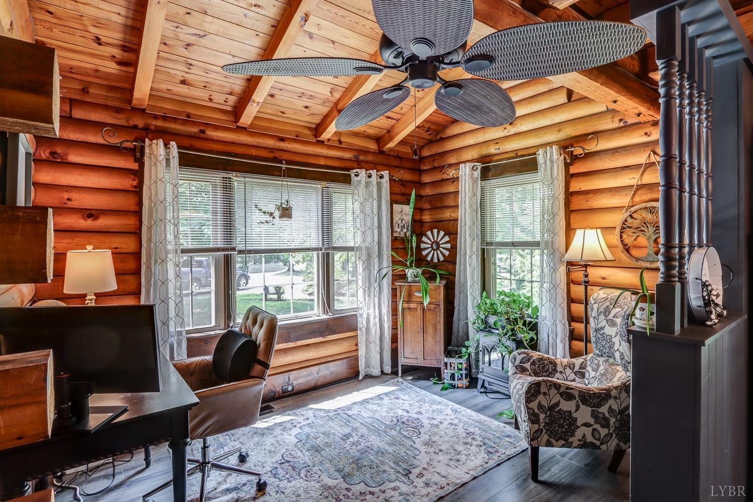 699 Gladys Road Gladys, VA 24554 - Photo 34 of 47 a living room with furniture and a large window