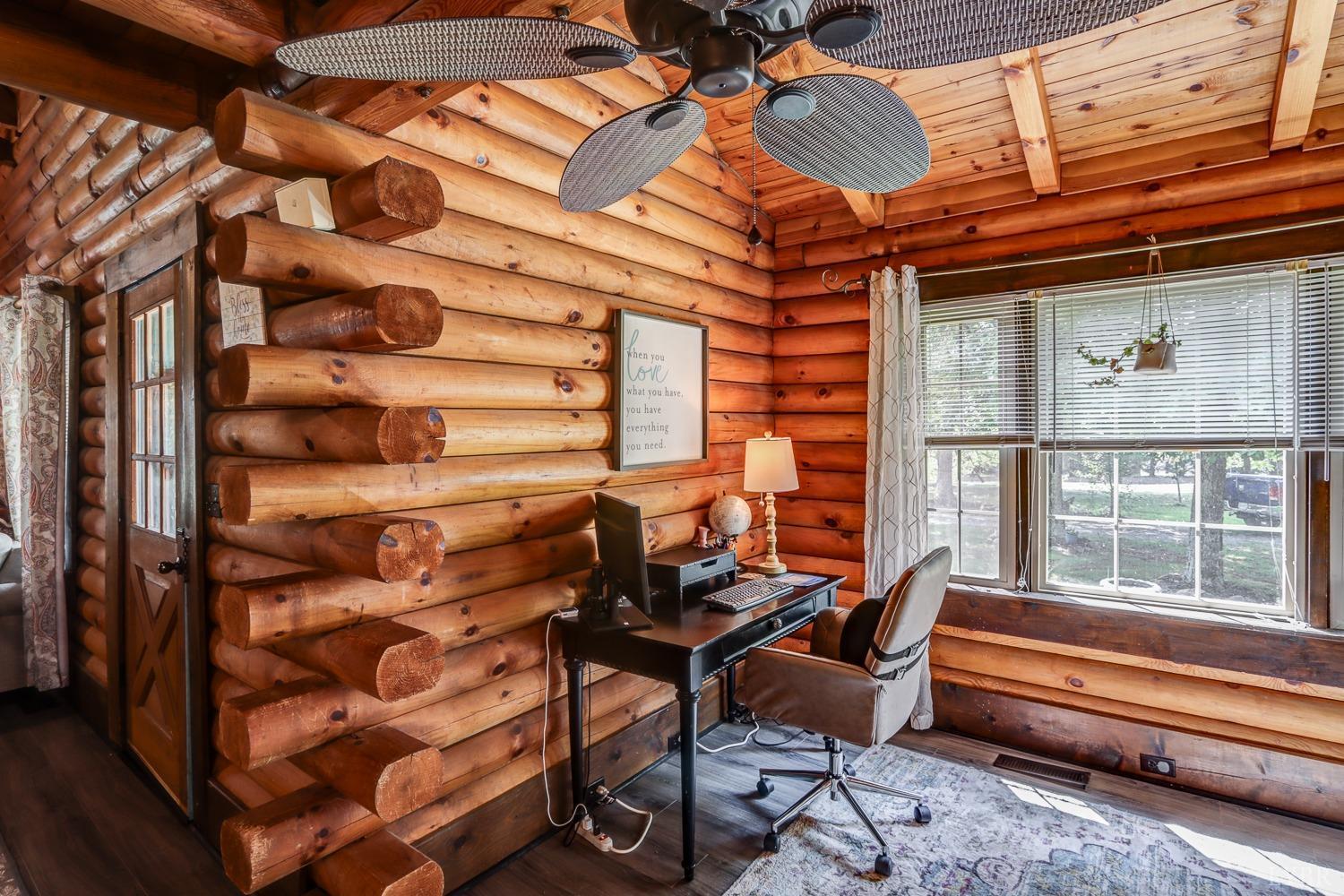 699 Gladys Road Gladys, VA 24554 - Photo 35 of 47 a backyard of a house with barbeque oven table and chairs