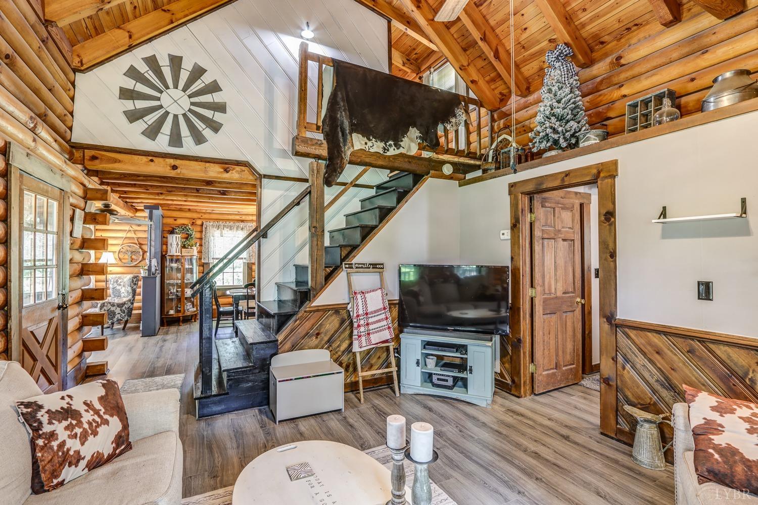 699 Gladys Road Gladys, VA 24554 - Photo 39 of 47 a outdoor space with lots of furniture and wooden floor