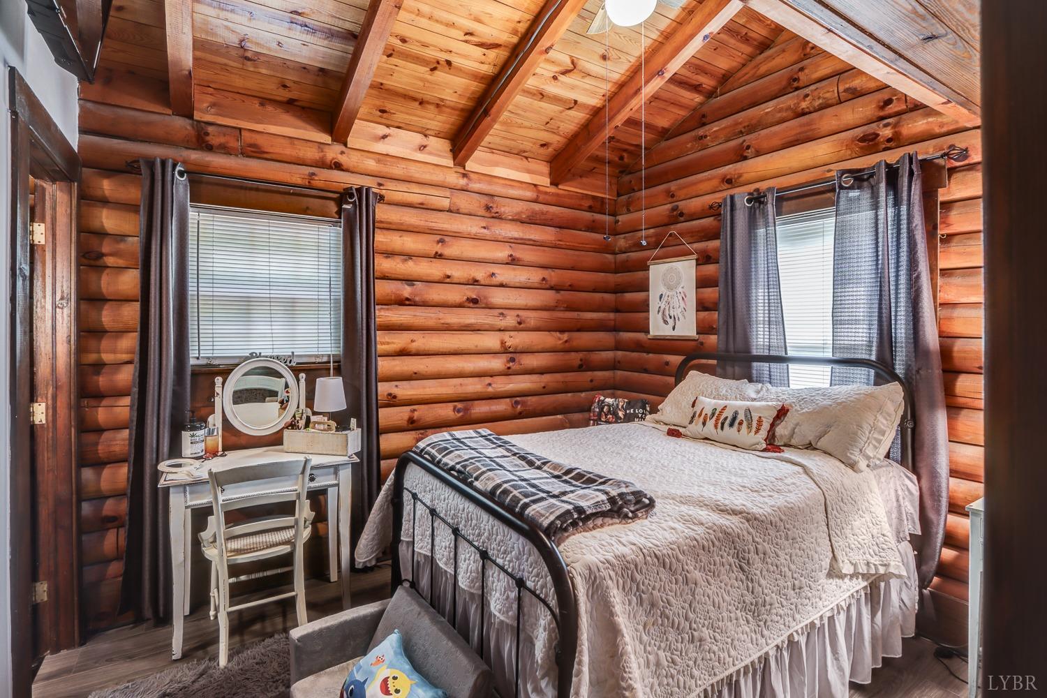 699 Gladys Road Gladys, VA 24554 - Photo 41 of 47 a bedroom with a bed and a dresser