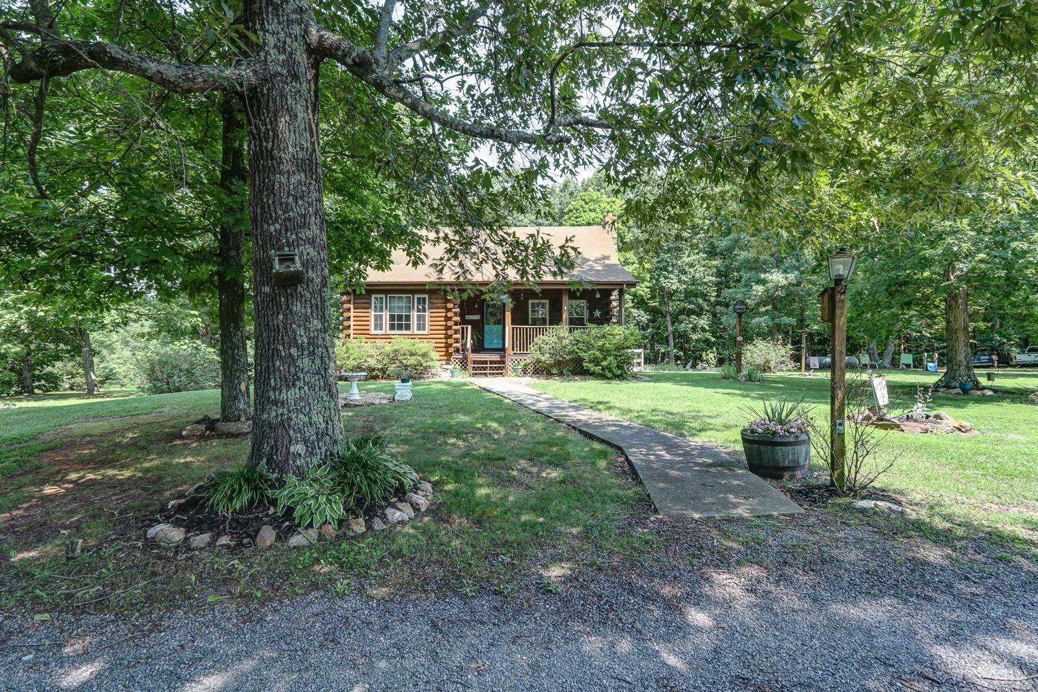 699 Gladys Road Gladys, VA 24554 - Photo 5 of 47 a view of a house with a yard