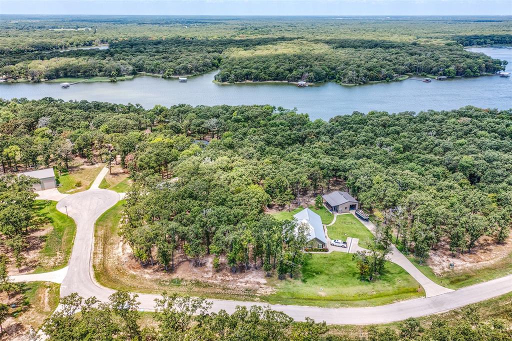 Lot 68 Anchor Point Quinlan, TX 75474 - Photo 3 of 16 Drone / aerial view of a large body of water