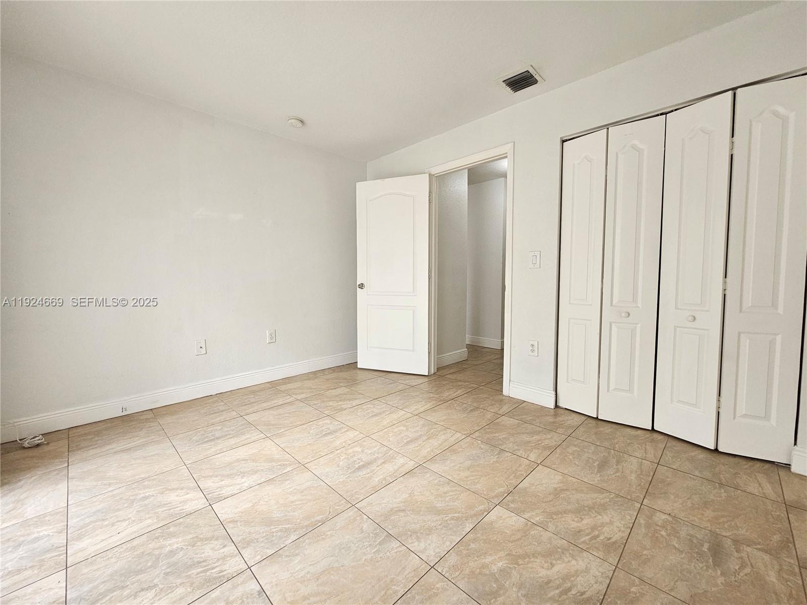 15447 Southwest 151st Street Miami, FL 33196 - Photo 8 of 25 a view of an empty room