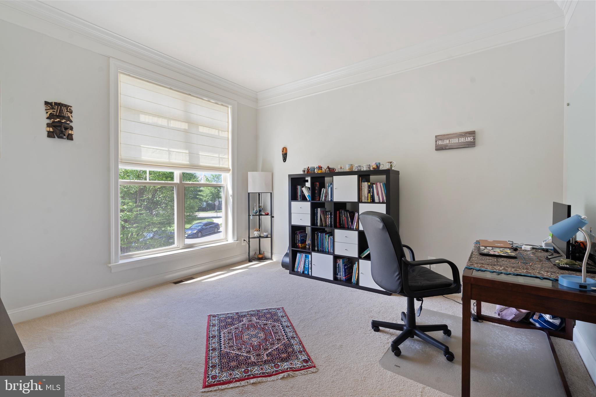 42735 Macauley Place Ashburn, VA 20148 - Photo 15 of 39 a view of a workspace with furniture and a window