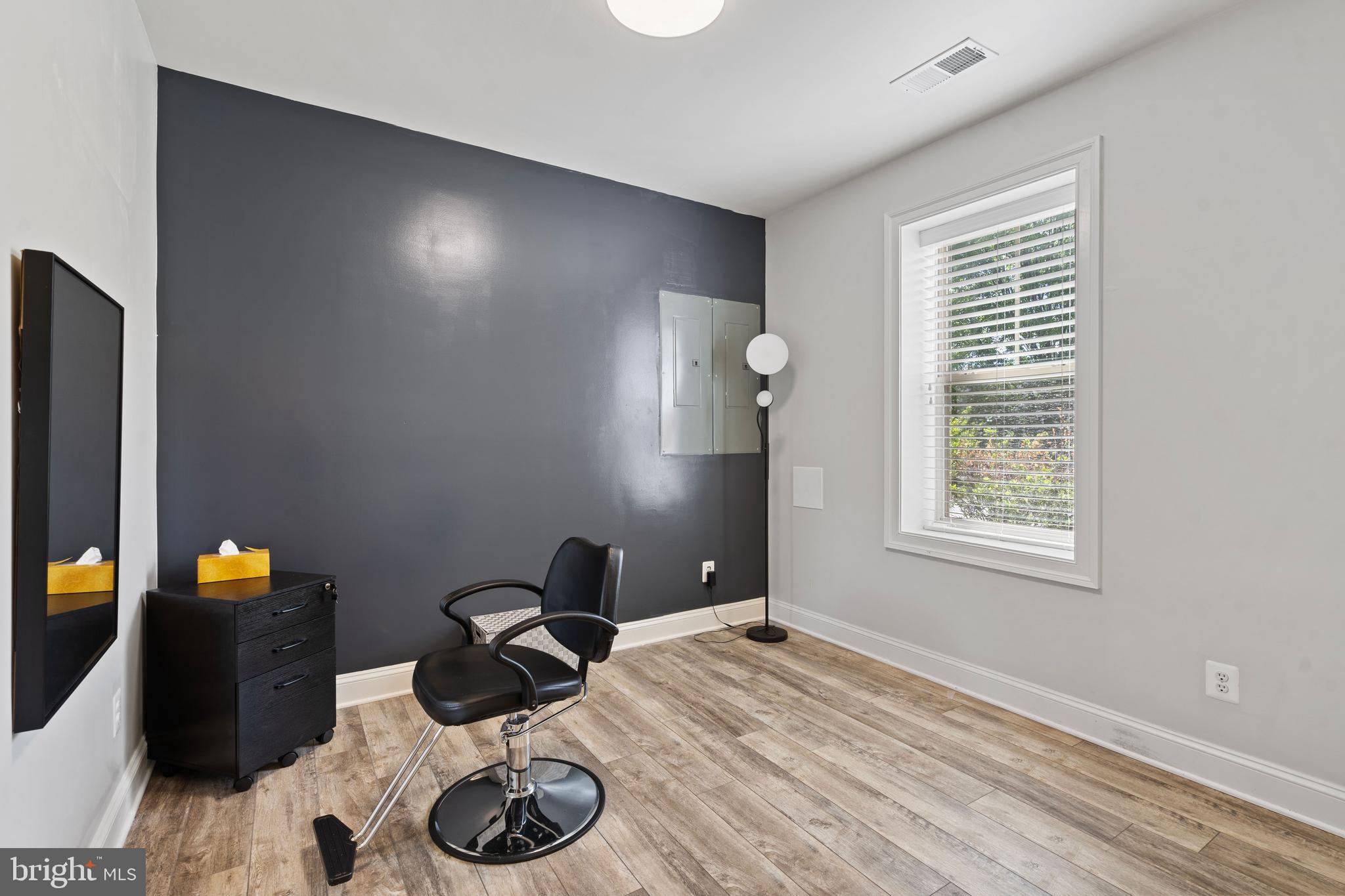 42735 Macauley Place Ashburn, VA 20148 - Photo 32 of 39 a bedroom with a bed and window