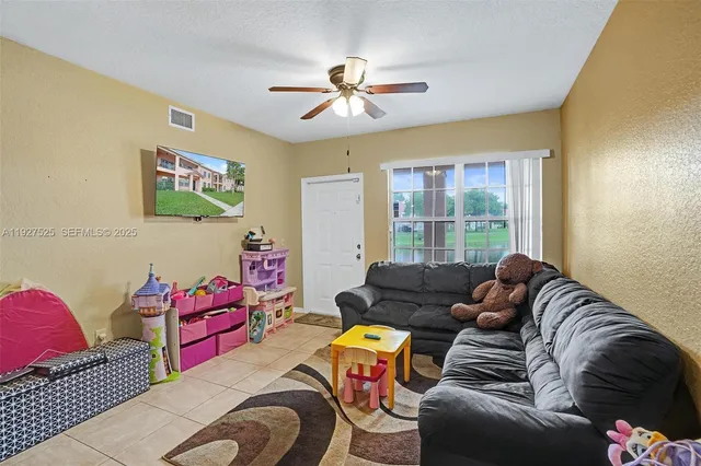 a kitchen with a stove and a microwave