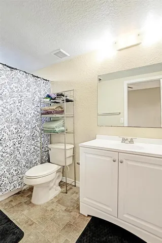 a utility room with a washing machine