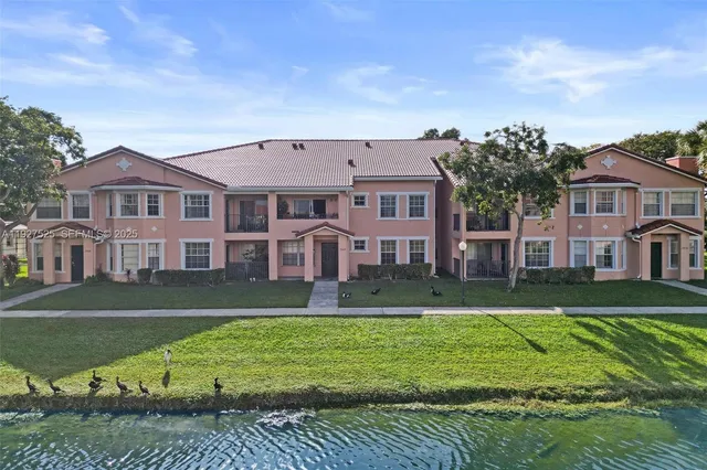 an aerial view of lake and city
