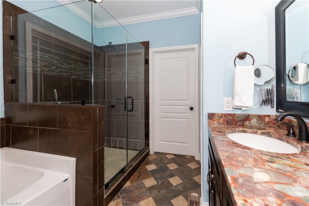 8926 Grove Park Drive Oak Ridge, NC 27310 - Photo 16 of 23 Gallery Image 16