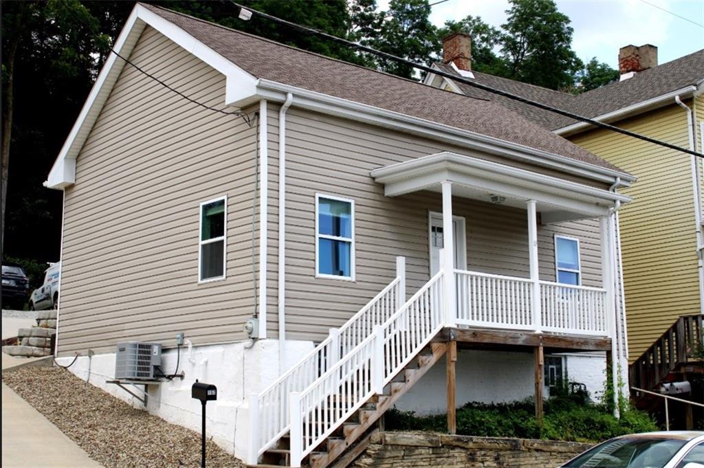 157 East College Street Canonsburg, PA 15317 - Photo 1 of 25 a view of house with a street