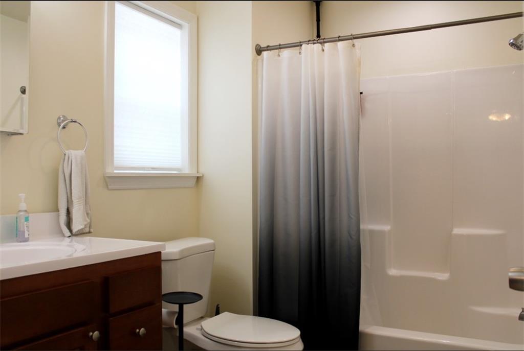 157 East College Street Canonsburg, PA 15317 - Photo 14 of 25 a bathroom with a sink a toilet and shower
