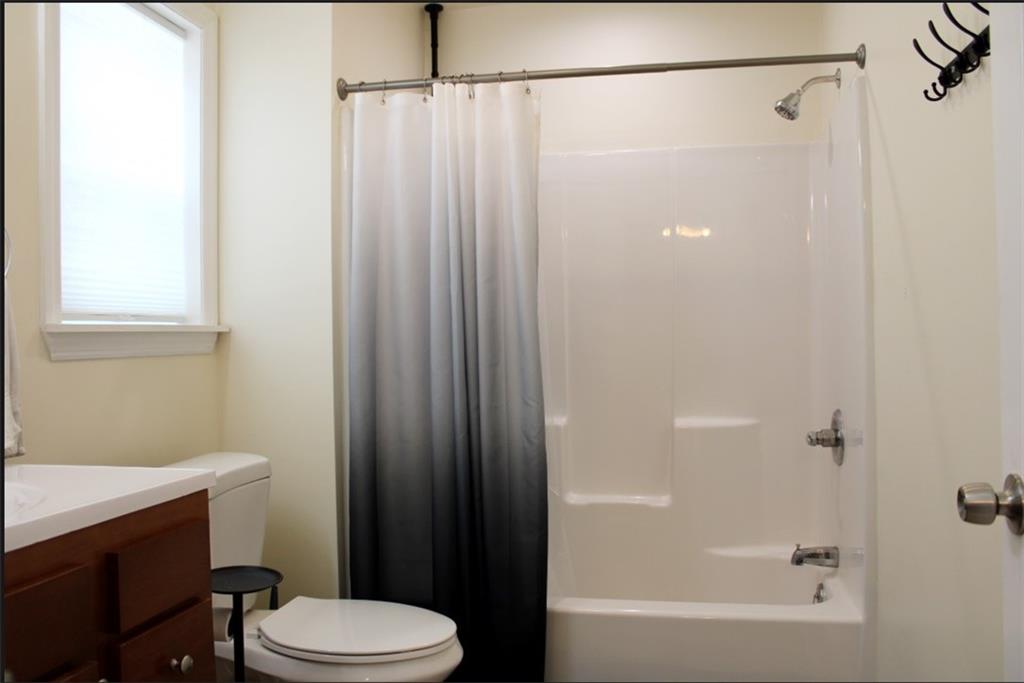 157 East College Street Canonsburg, PA 15317 - Photo 15 of 25 a bathroom with a shower a toilet and a sink