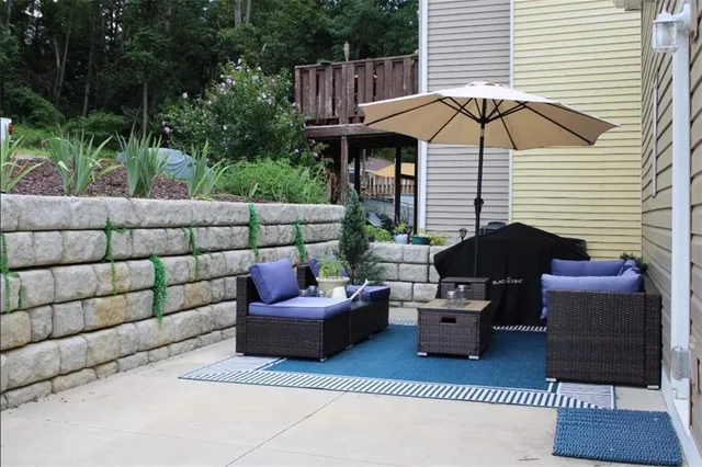 a building outdoor space with patio furniture