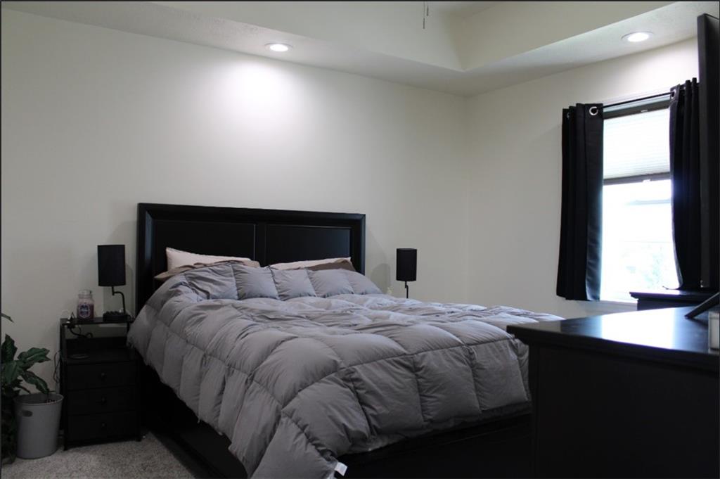 157 East College Street Canonsburg, PA 15317 - Photo 9 of 25 a bedroom with a bed and a window