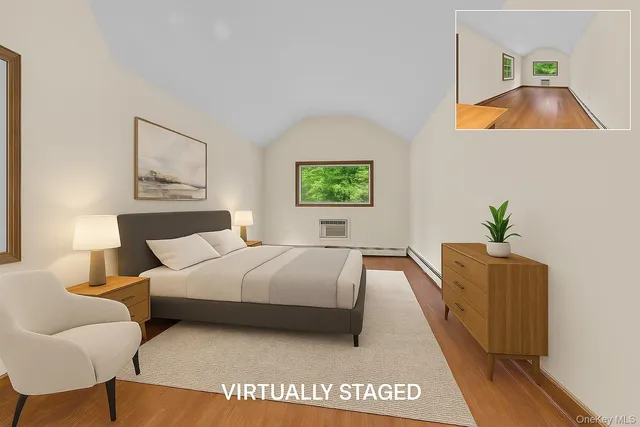 a bedroom with a bed and a couch